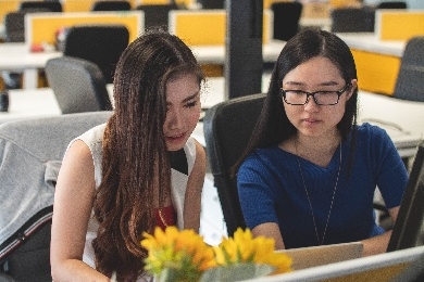 Women looking at a computer