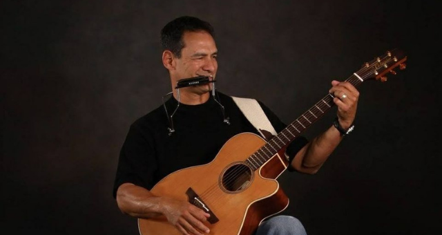 Bo Garza playing guitar